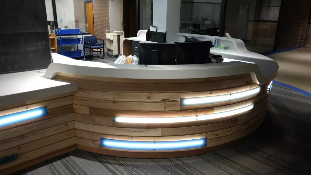 Circulation Desk at Saginaw Valley State University | Office Furniture with Custom Lighting