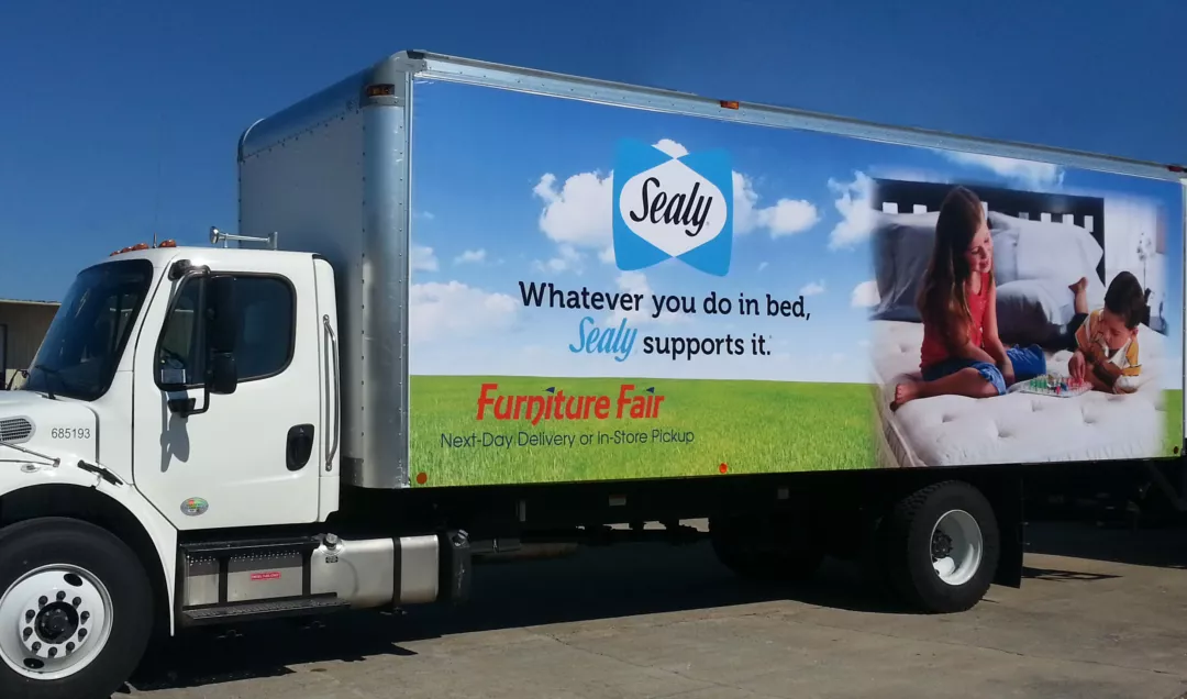 Custom Truck Skin Vinyl Banner Graphics on a Delivery Truck