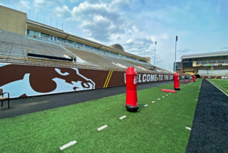 Custom Mesh Banners Inside of WMU’s Stadium With a Mascot