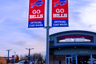 Sports Team Advertised on Light Pole Banners | Pole Banner Brackets and Banners
