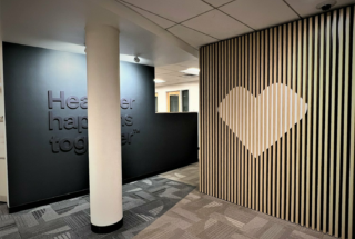Custom Wooden Wall with Logo | Slatwall with Design