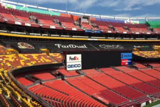 Mesh Banners as Custom Seat Covers for Empty Stadium Seats.