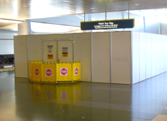 Temporary barricade walls for construction inside of an airport