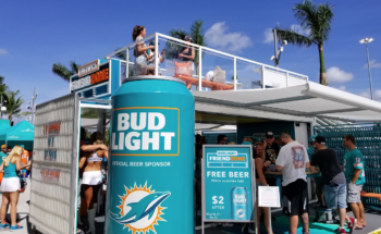 A custom shipping container at a Miami Dolphins event
