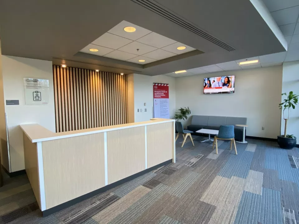 Wooden Reception Desk with Slatwall | Interior Business Design
