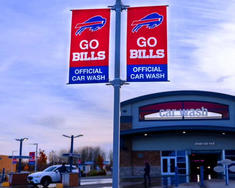 Sports Team Advertised on Light Pole Banners | Pole Banner Brackets and Banners