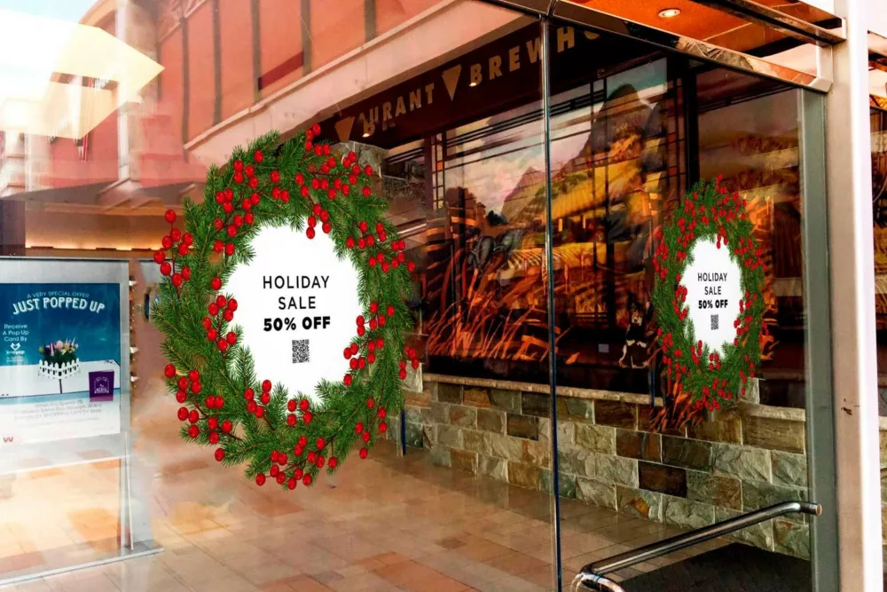 Holiday window decals with special shopping deals