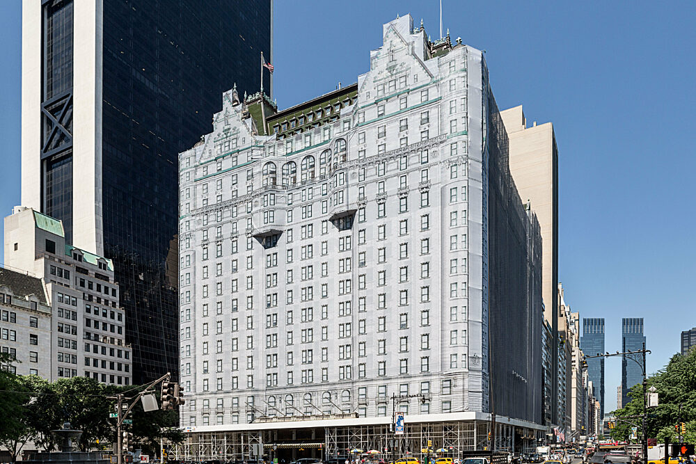 Plaza hotel with a Britten building wrap