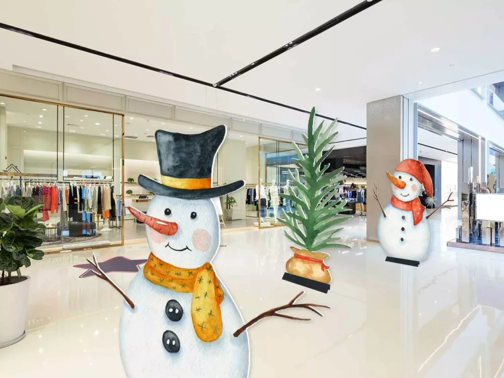 Snowmen cutout displays inside of a shopping mall