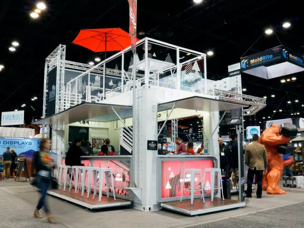 Box Pop shipping container set up for a trade show with rooftop seating