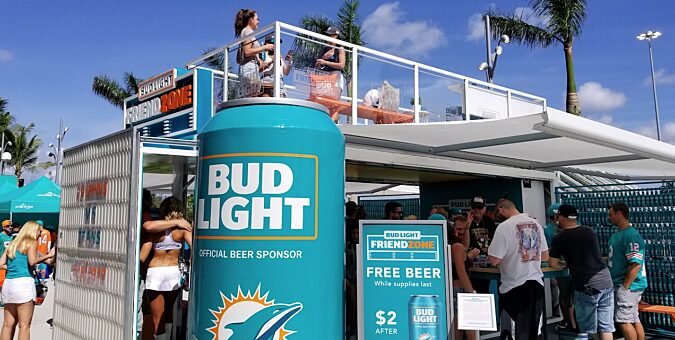A custom shipping container at a Miami Dolphins event