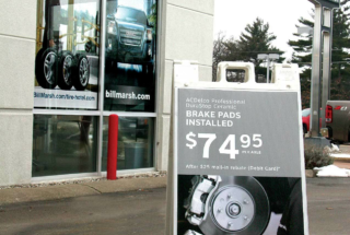 Folding A-Frame Sandwich Boards With Custom Graphics Outside of a Retail Store