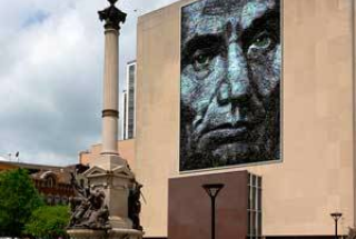 Heavy Duty Banner Frame and Custom Art Banner on the Outside of a Building.