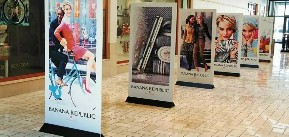 Dimensional Banner Standees With Custom Banners Inside of a Shopping Mall