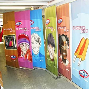 Retractable banner stands with custom advertising graphics.