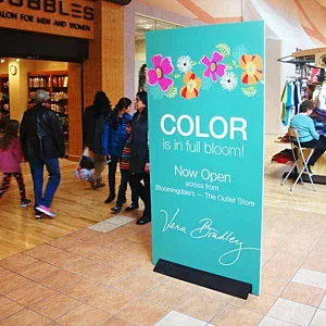 Customized foamboard rigid sign advertising a Vera Bradley store inside of a shopping center.