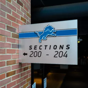 Custom printed wayfinding signage at a football stadium for the Detroit Lions.